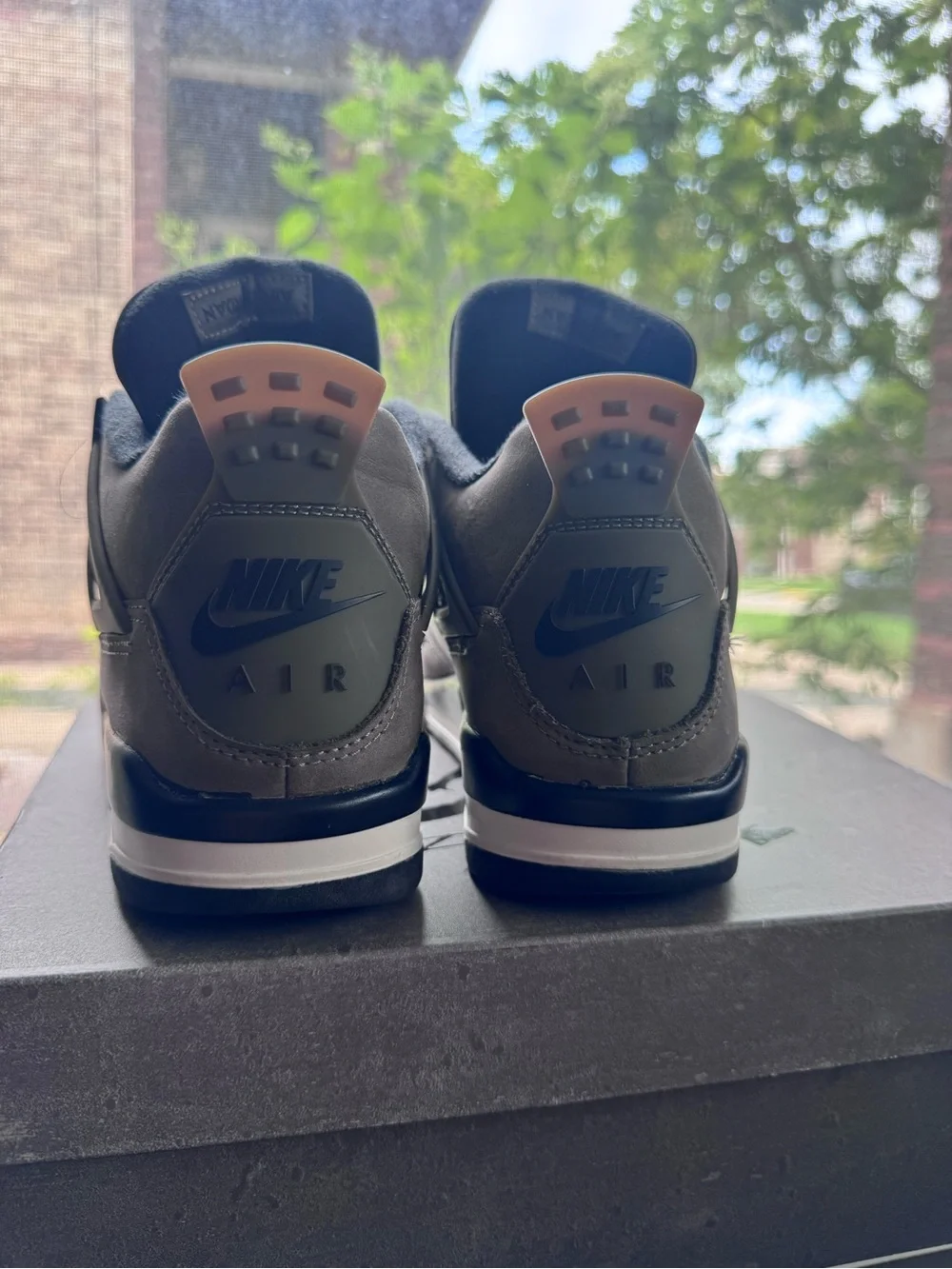 Air Jordan 4 Retro Sneakers in Dark Grey